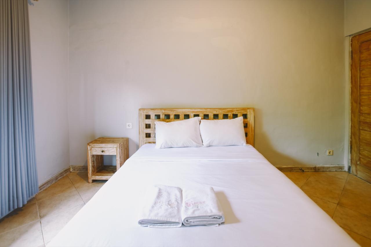Отель Swan House Canggu Экстерьер фото