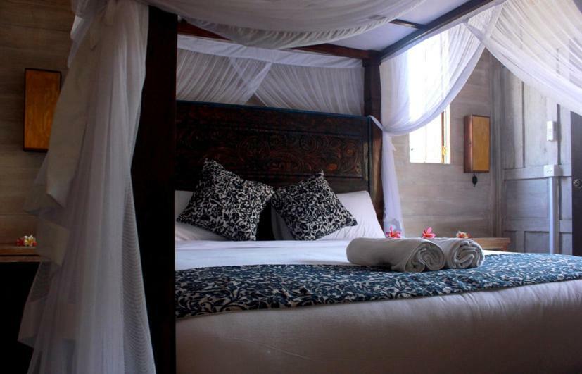 Отель Swan House Canggu Экстерьер фото